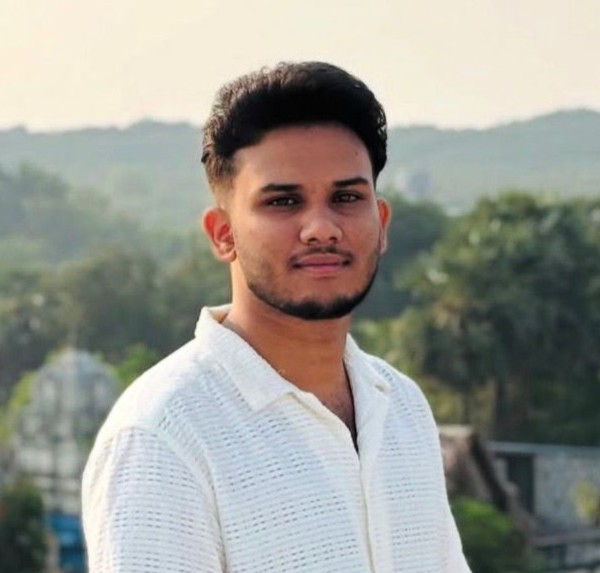 Adhil T